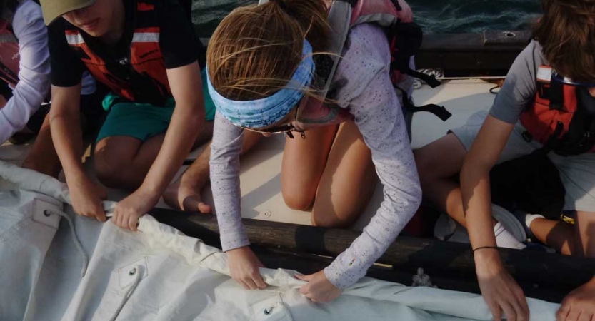 middle schoolers learn sailing skills at outdoor school